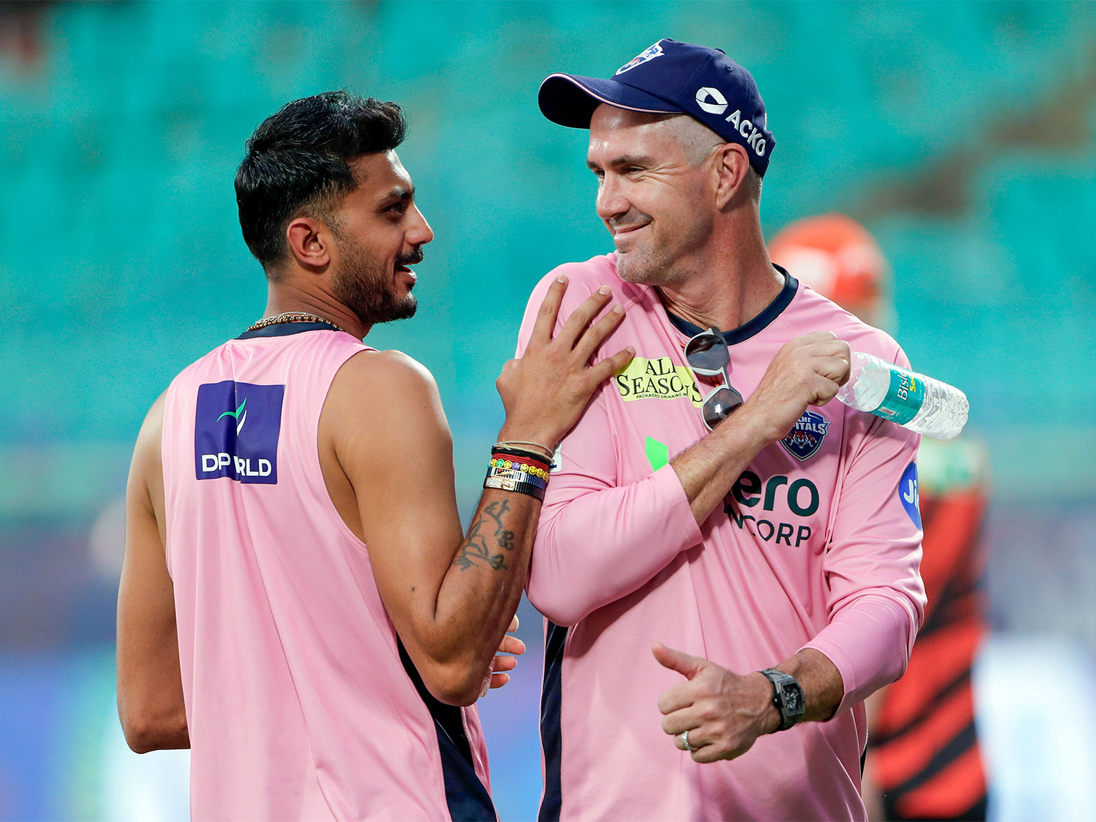 Delhi Capitals' mentor Kevin Pietersen with Axar Patel. (Photo/ANI)