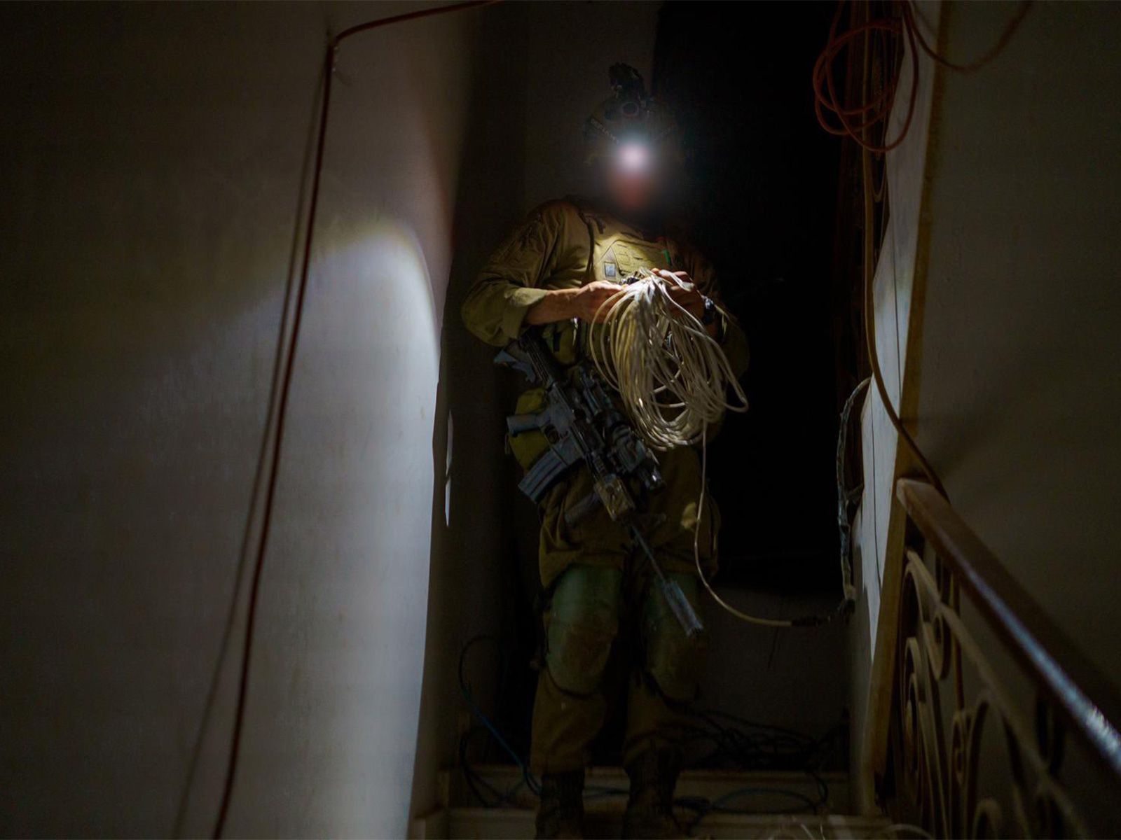 An IDF soldier inspects wiring inside a structure during targeted ground operations against Hezbollah positions in southern Lebanon. (Photo: X/@idfonline) An IDF soldier inspects wiring inside a structure during targeted ground operations against Hezbollah positions in southern Lebanon. (Photo: X/@idfonline)