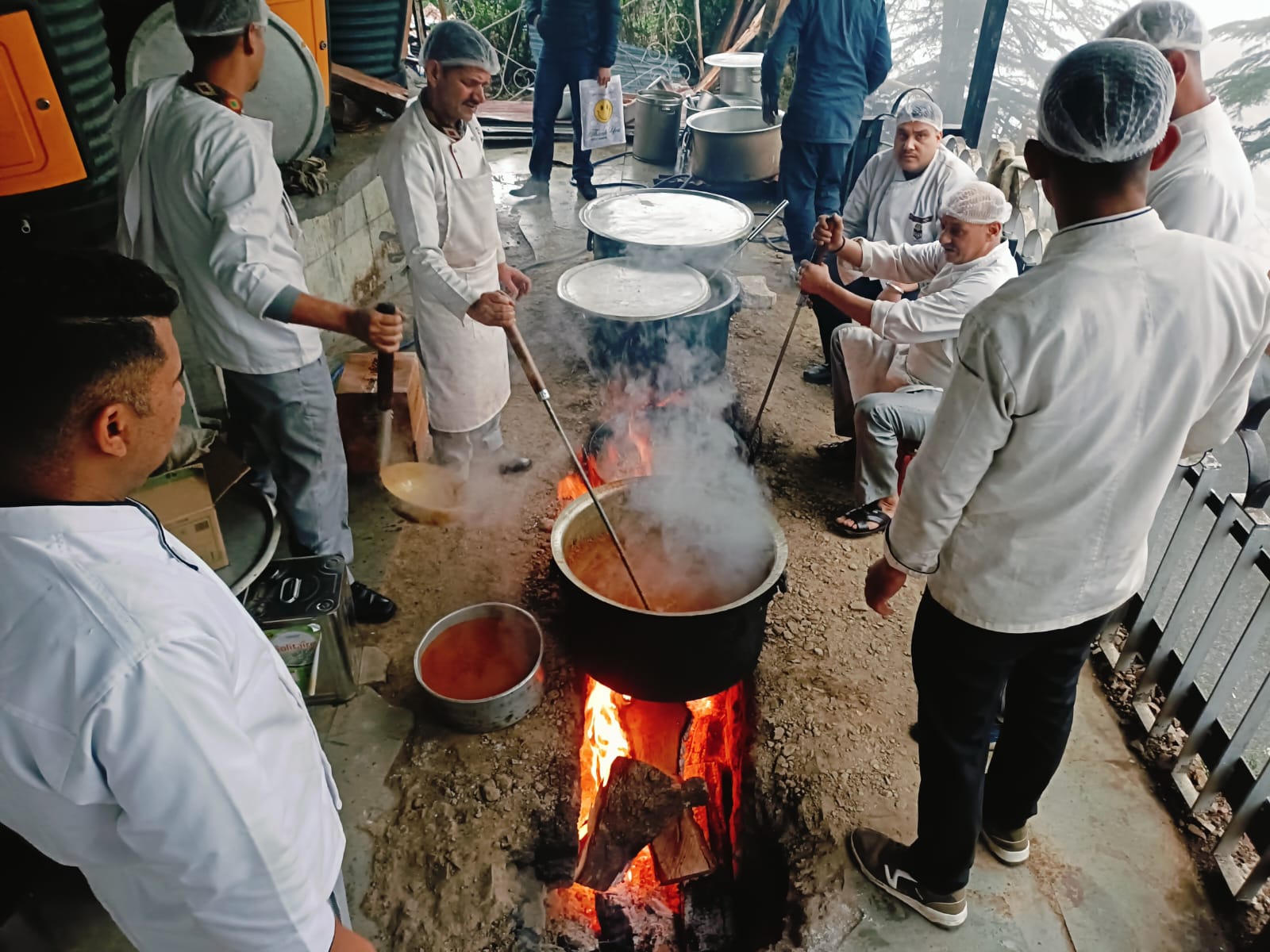 HPTDC chefs use wood-fired oven to cook food in Himachal Pradesh (Photo/ANI)
