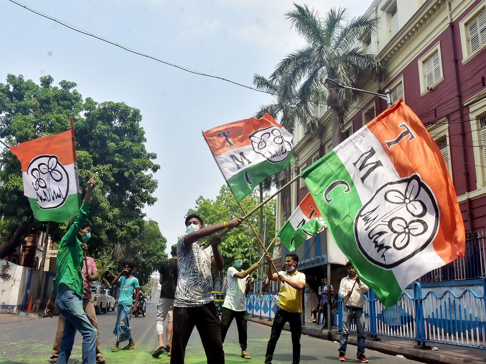 TMC supporters wave party flag in Kolkata (File Photo/ANI)