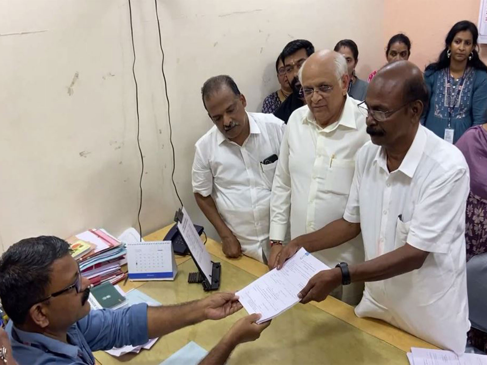 NDA candidate from Nattika C C Mukundan with Gujarat Chief Minister Bhupendra Patel and BJP city district President Justin Jacob (Photo/ANI)