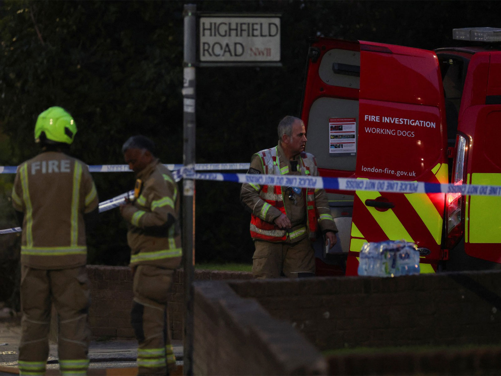 Firefighters work at the scene after four ambulances belonging to Hatzola, a Jewish community organisation, were set on fire in northwest London (Photo/ Reuters)