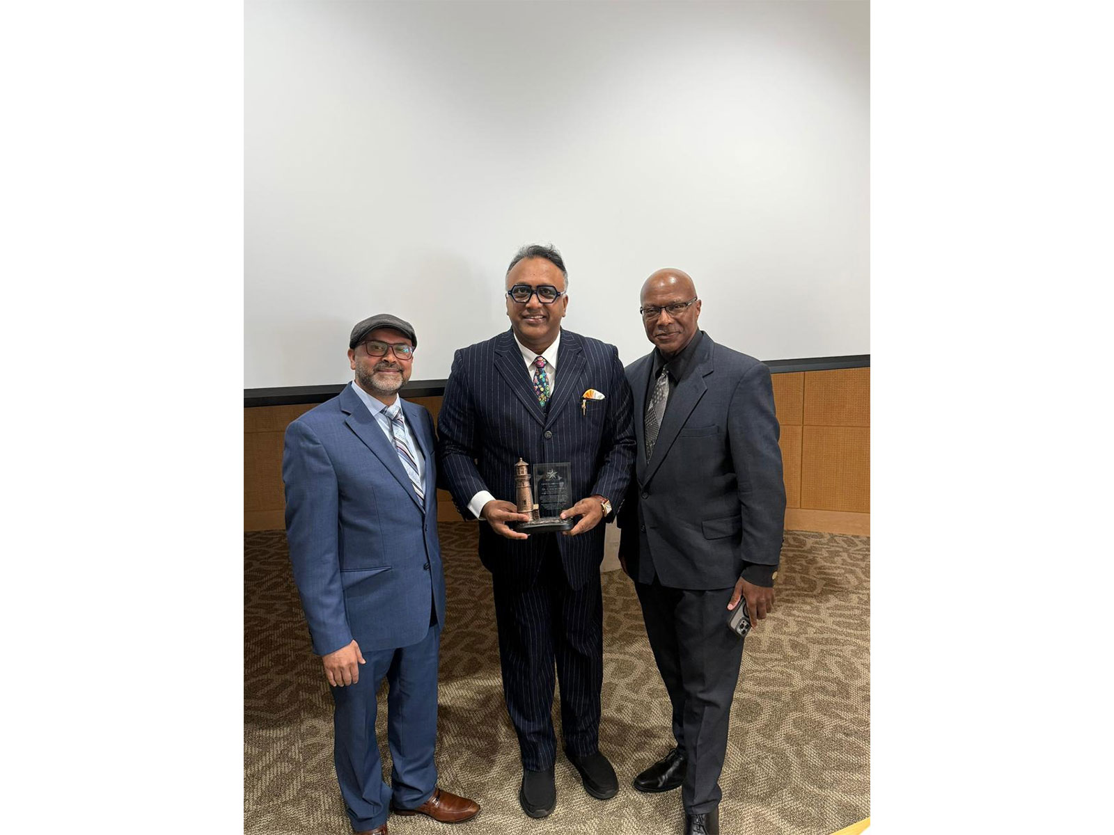 Professor Dr. Uttam Gowli, President & Dr. Keith Wright, Vice President, Star Scholars Network presenting the Lighthouse Leadership Award to Professor Dr. C. Raj Kumar Professor Dr. Uttam Gowli, President & Dr. Keith Wright, Vice President, Star Scholars Network presenting the Lighthouse Leadership Award to Professor Dr. C. Raj Kumar