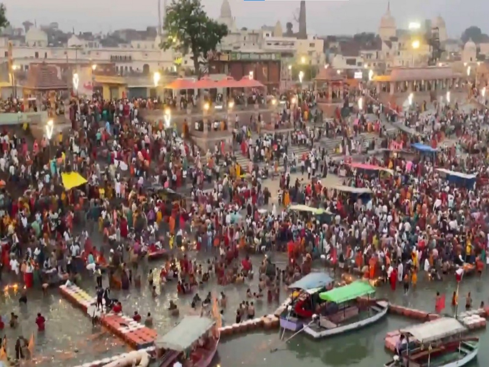 Devotees in large numbers take a holy dip in the Saryu river on the occasion of Rama Navami (Photo/ANI) Devotees in large numbers take a holy dip in the Saryu river on the occasion of Rama Navami (Photo/ANI)