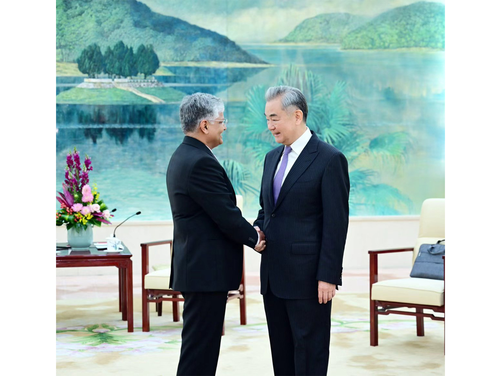 Chinese Foreign Minister Wang Yi with outgoing Indian Ambassador to China Pradeep Kumar Rawat (Photo/X@China_Amb_India) Chinese Foreign Minister Wang Yi with outgoing Indian Ambassador to China Pradeep Kumar Rawat (Photo/X@China_Amb_India)