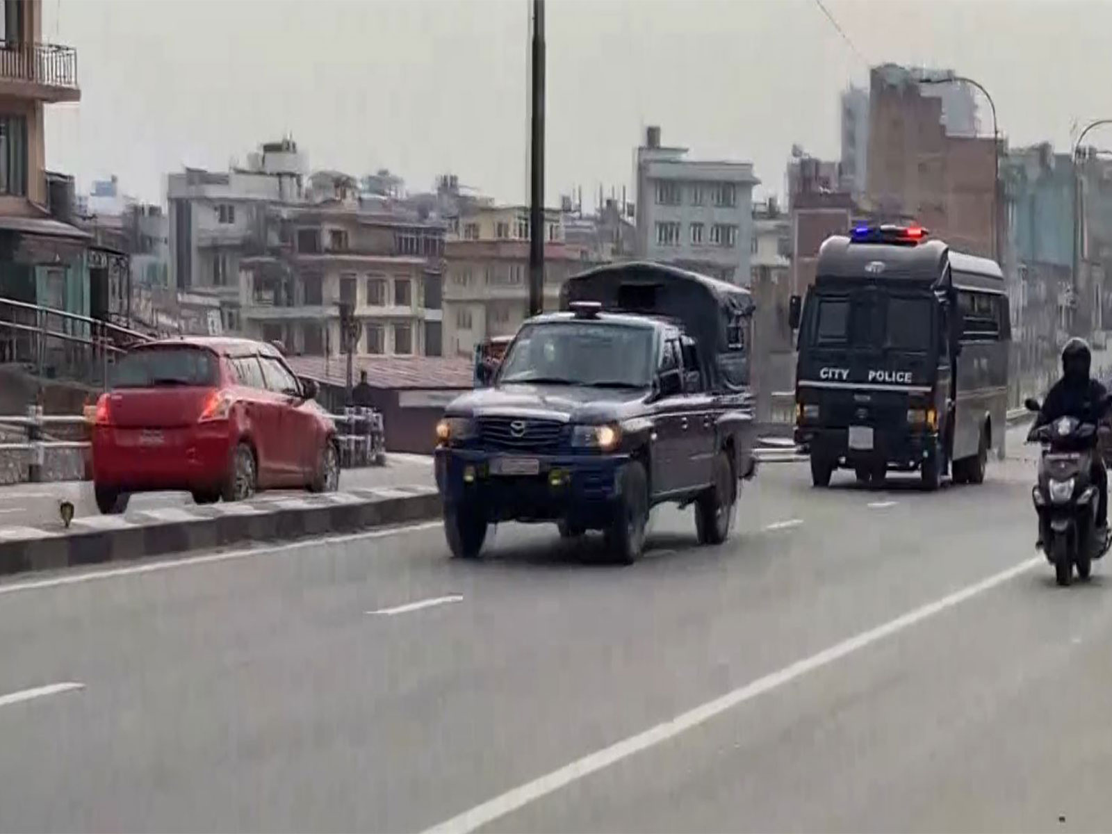 Police teams taking KP Sharma Oli in custody (Photo/ANI) Police teams taking KP Sharma Oli in custody (Photo/ANI)