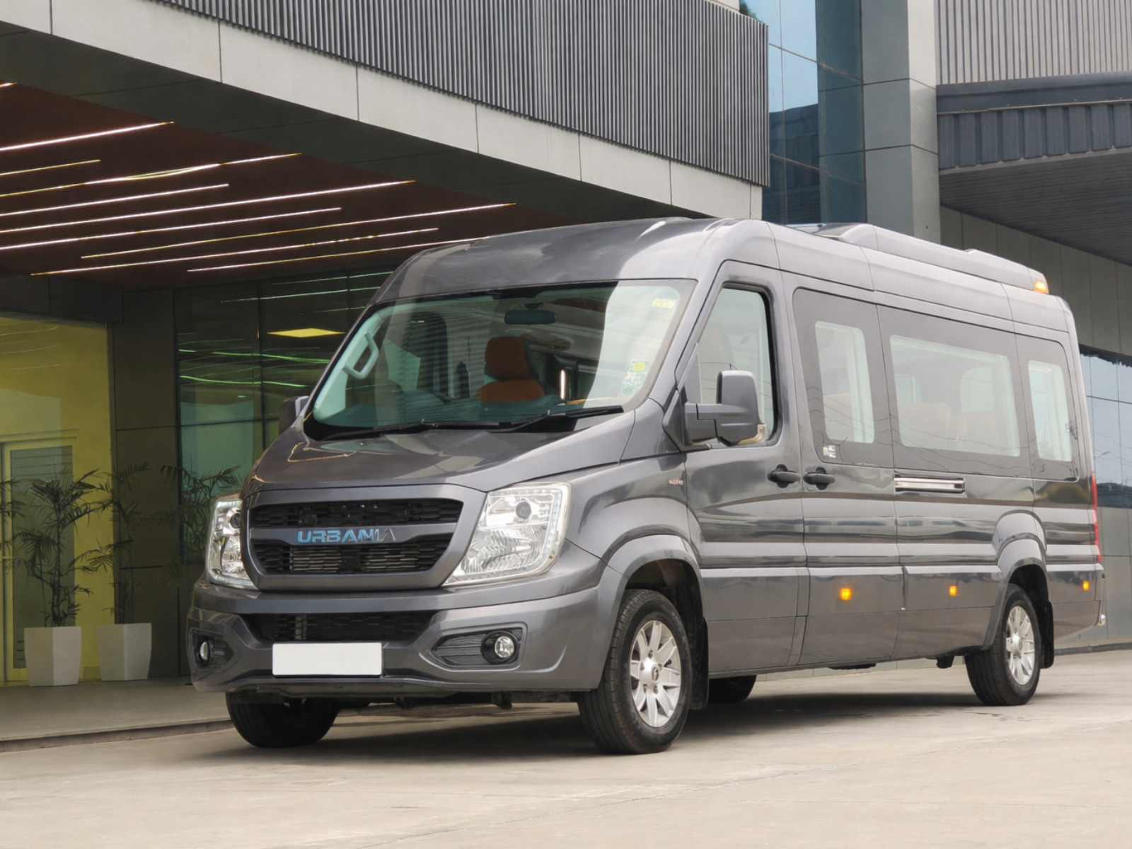 The Force Urbania — Gujarat Travels' flagship premium passenger van, now available in Ahmedabad in 10, 12, and 16-seater configurations