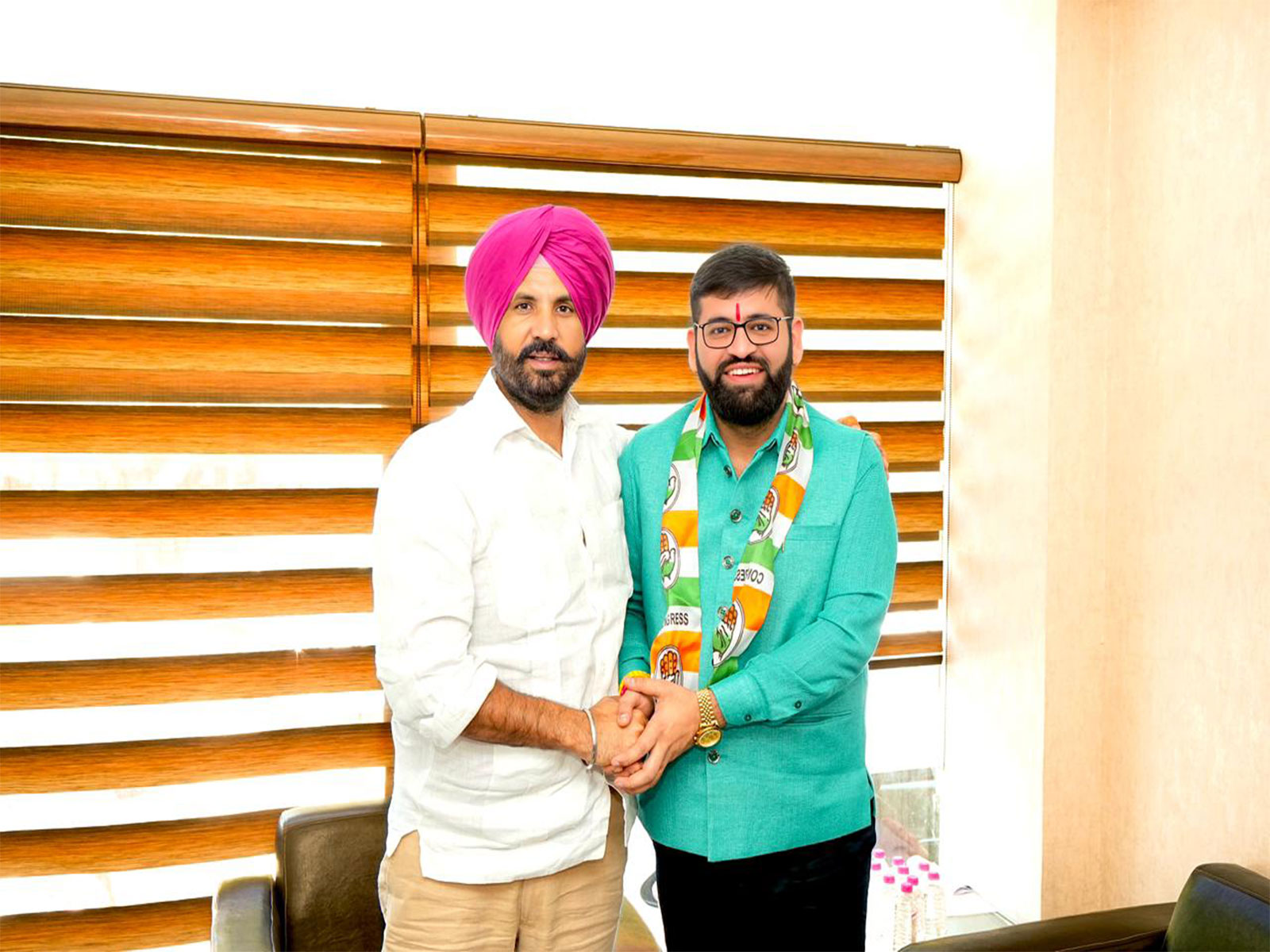 Advocate Vasu Ranjan with Punjab President Raja Warring (Photo/ANI)