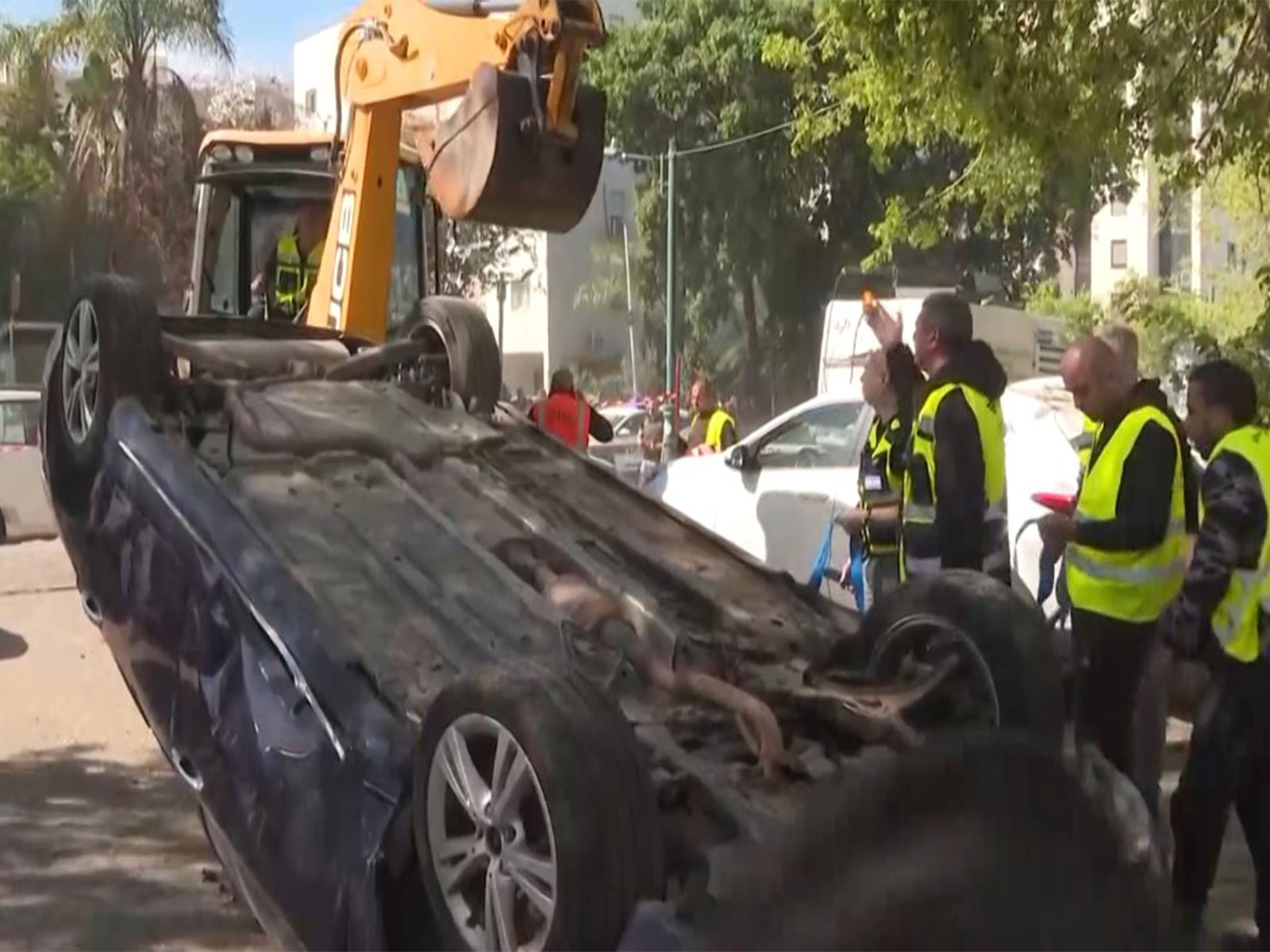 Iran missile strike damages cars and infrastructure in Ramat Hasharon, Israel (Photo/Reuters) Iran missile strike damages cars and infrastructure in Ramat Hasharon, Israel (Photo/Reuters)