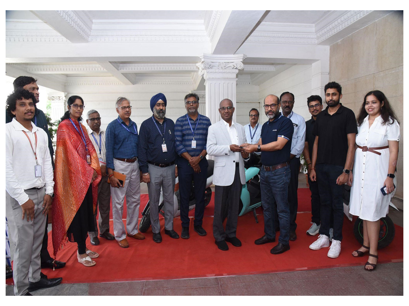 Dignitaries from SRMIST and Ather Energy during the handover of three electric vehicles. Dignitaries from SRMIST and Ather Energy during the handover of three electric vehicles.