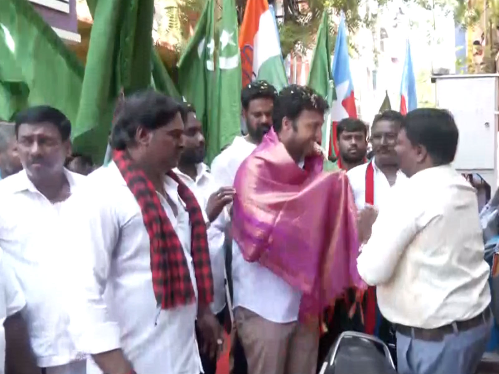 DMK candidate Karthik Mohan conducts door-to-door campaign (Photo/ANI)