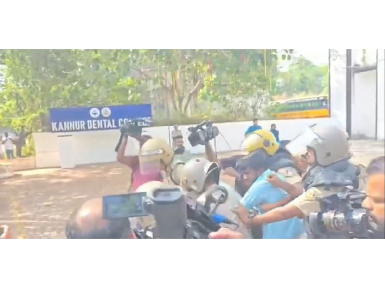 KSU activists being forcibly removed by police from Anjarakandy dental college in Kannur, Keralam on April 13, 2026 (Photo/ANI)