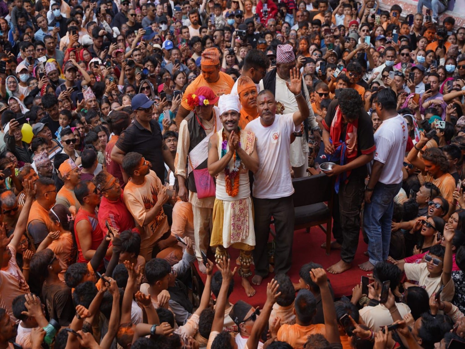 Devotee Sujan Bagh Shrestha stands on a platform amid a large crowd after performing the tongue-piercing ritual during Jibro Chedne Jatra in Bode, Bhaktapur. (Photo/ANI) Devotee Sujan Bagh Shrestha stands on a platform amid a large crowd after performing the tongue-piercing ritual during Jibro Chedne Jatra in Bode, Bhaktapur. (Photo/ANI)
