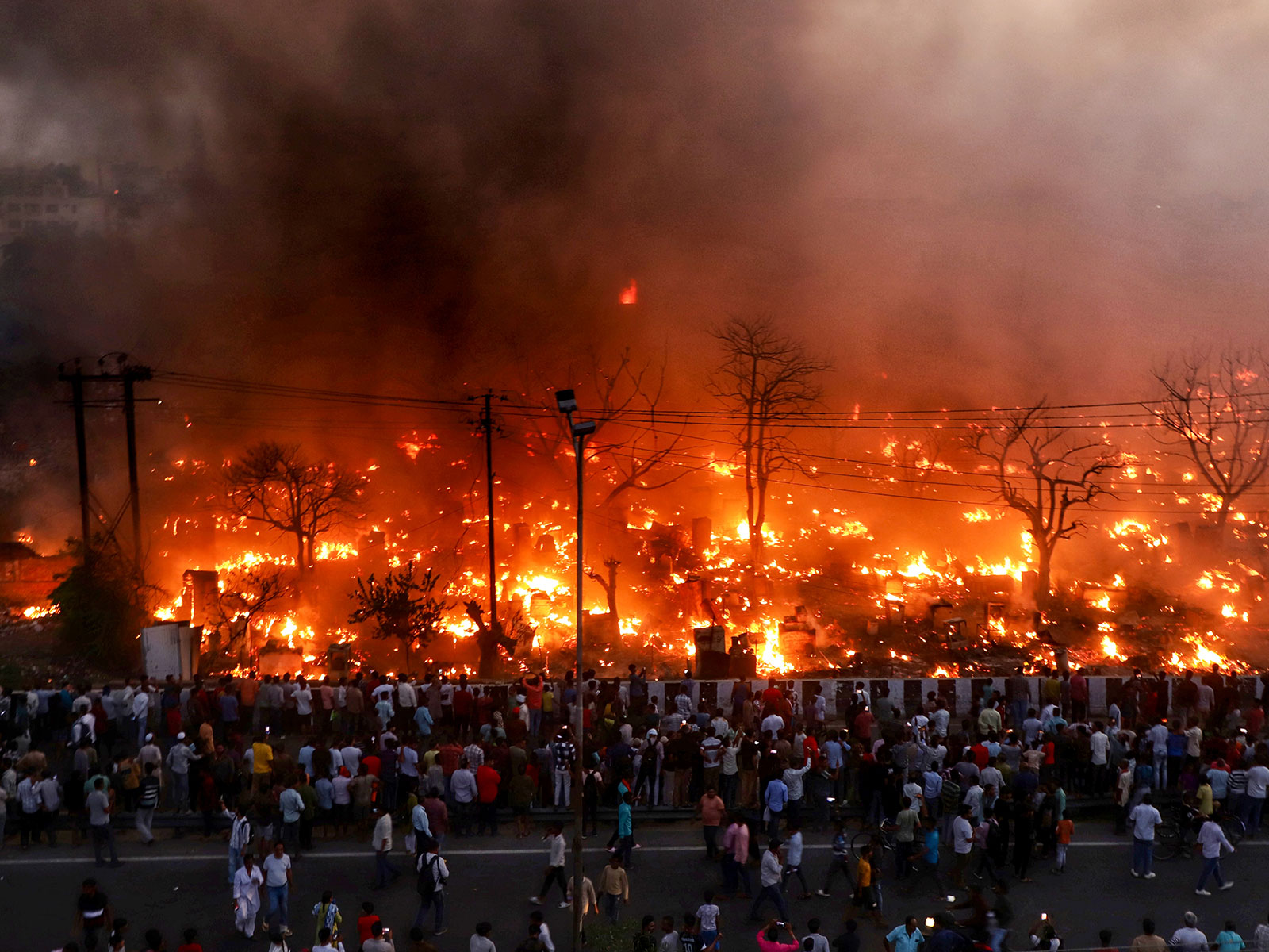 Fire breaks out in a slum area under Vikas Nagar station (Photo/ANI)