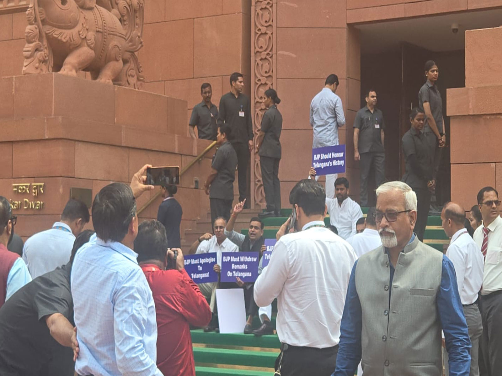 Opposition MPs protest against Tejasvi Surya outside Parliament (Photo/ANI) Opposition MPs protest against Tejasvi Surya outside Parliament (Photo/ANI)