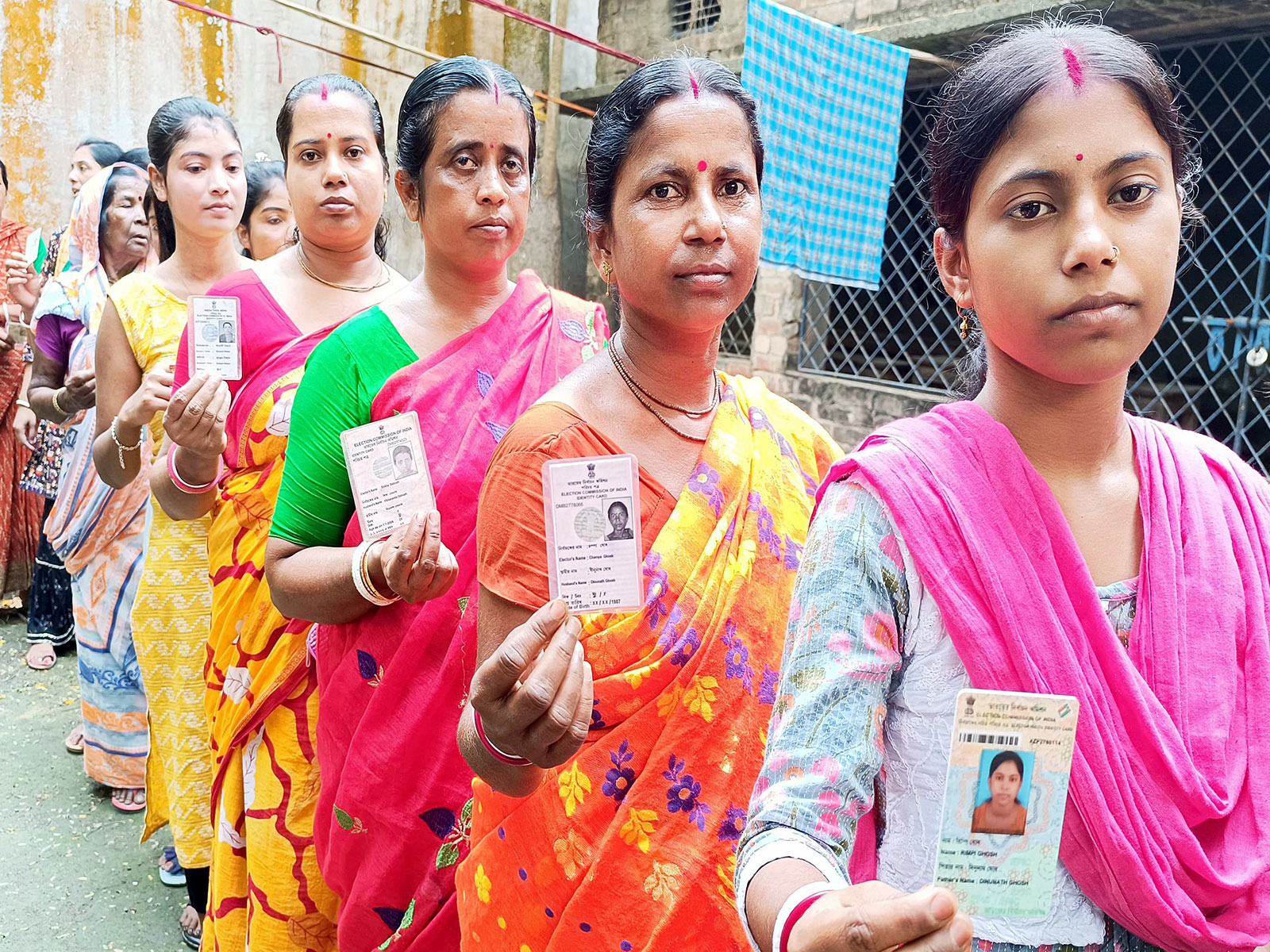 Women voters stand in queue to cast their votes in West Bengal (File Photo/ANI)