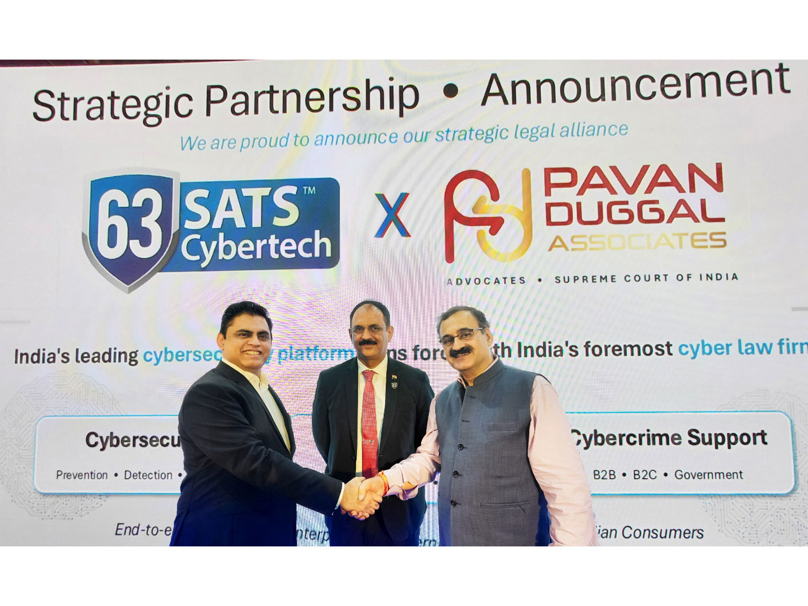 63SATS Cybertech MD & CEO Neehar Pathare joins hands with Dr. Pawan Duggal for a strategic alliance in front of 63SATS Chairman Lt. Gen M U Nair during CyberSec Expo in Mumbai 63SATS Cybertech MD & CEO Neehar Pathare joins hands with Dr. Pawan Duggal for a strategic alliance in front of 63SATS Chairman Lt. Gen M U Nair during CyberSec Expo in Mumbai
