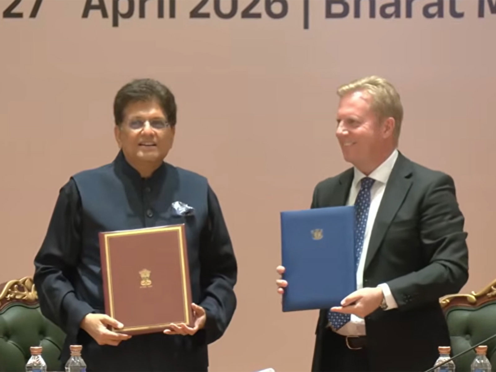 Piyush Goyal and Todd McKlay shake hands post signing the FTA (Photo/ANI) Piyush Goyal and Todd McKlay shake hands post signing the FTA (Photo/ANI)