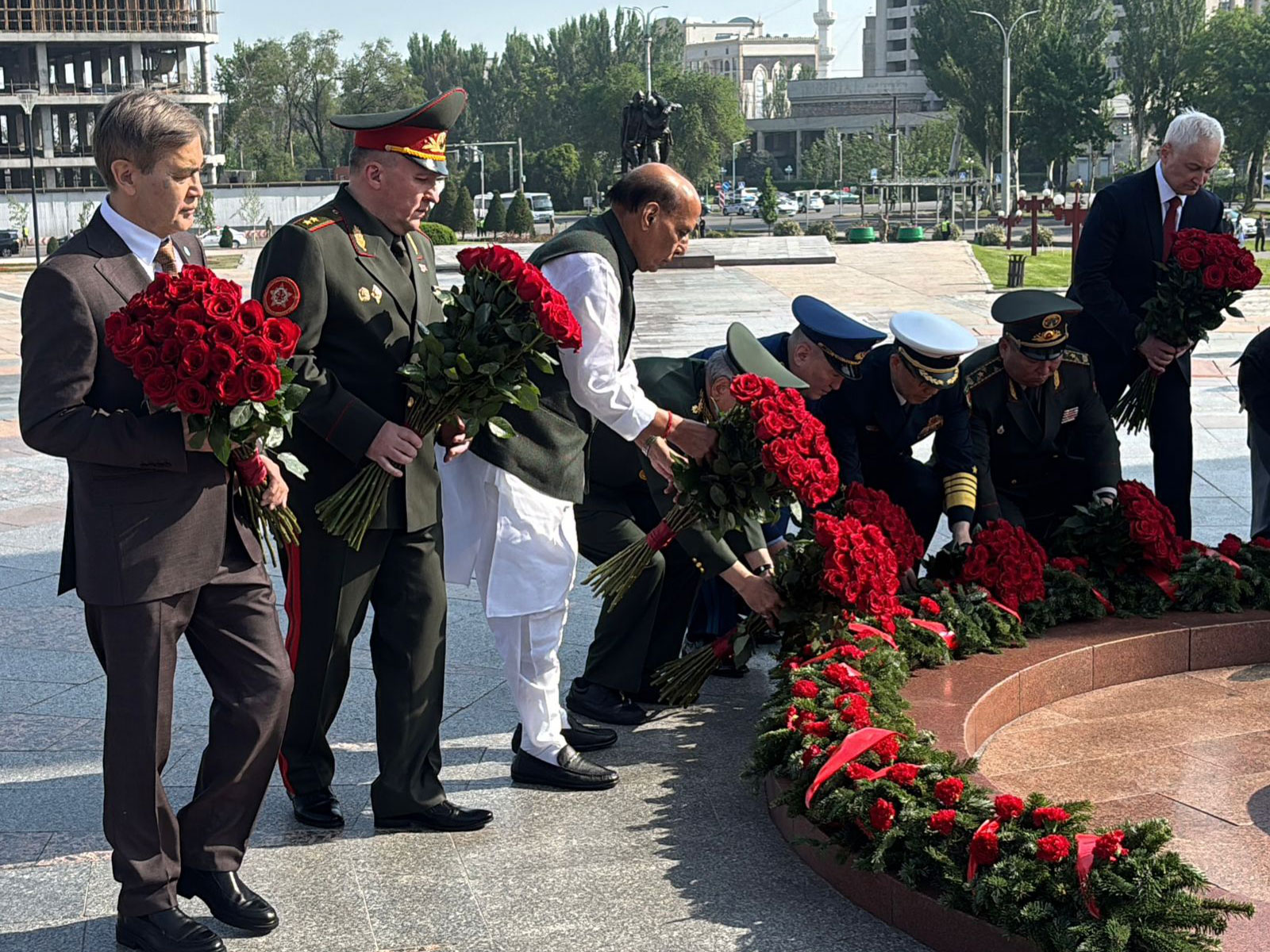 Defence Minister Rajnath Singh lays a wreath at Victory Square in Bishkek. (Photo/ANI) Defence Minister Rajnath Singh lays a wreath at Victory Square in Bishkek. (Photo/ANI)