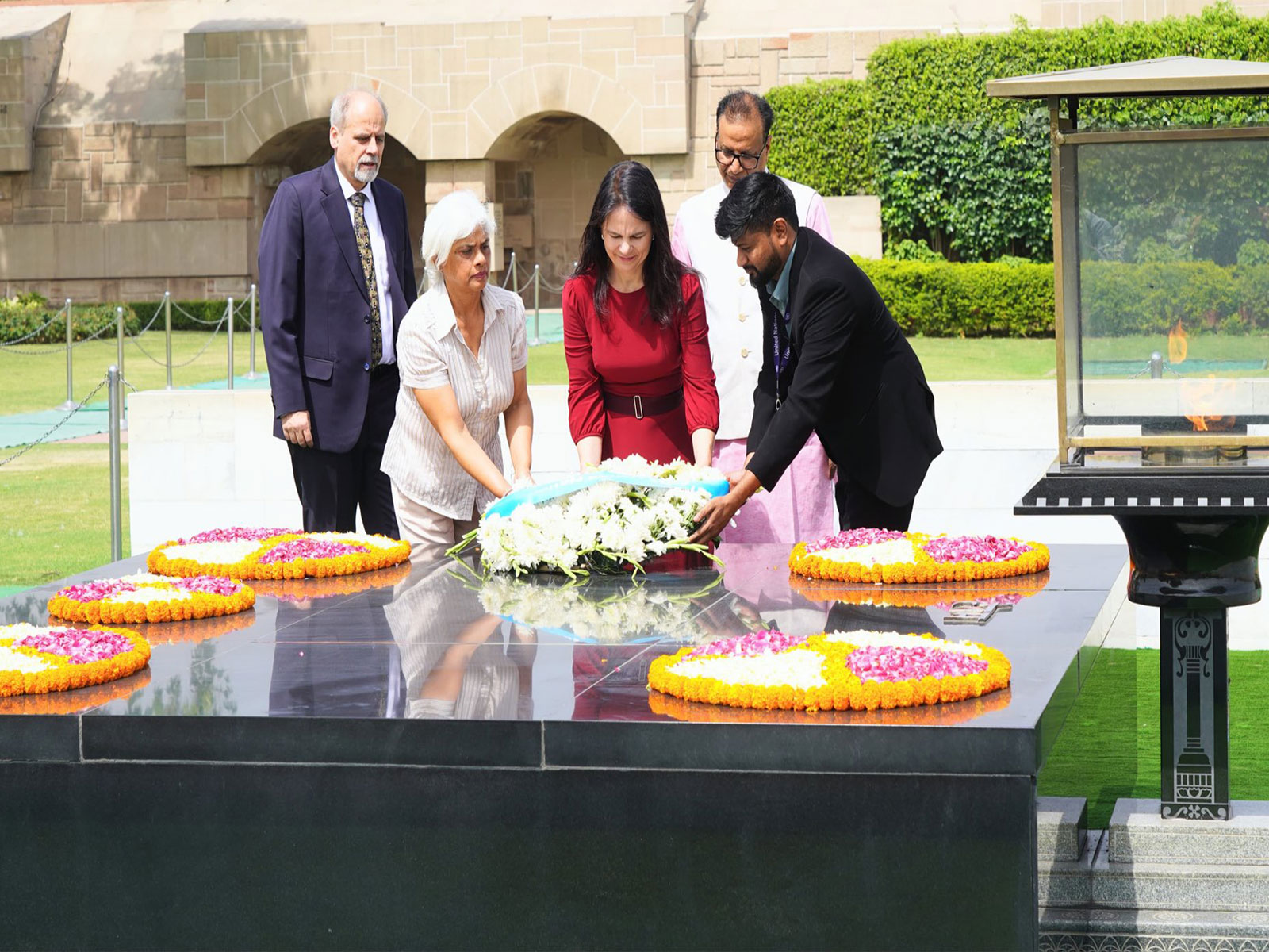 UNGA President Annalena Baerbock pays homage to Mahatma Gandhi at Rajghat. (Photo: X/@MEAIndia)