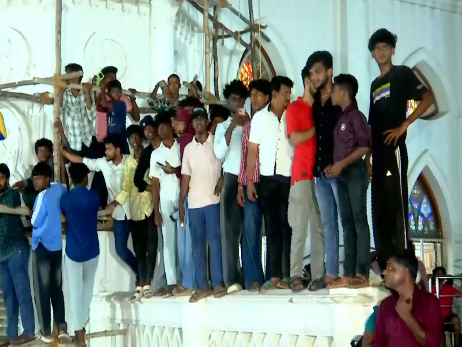 TVK chief Vijay's supporters waiting for the mega star's arrival near Basilica (Photo/ANI)