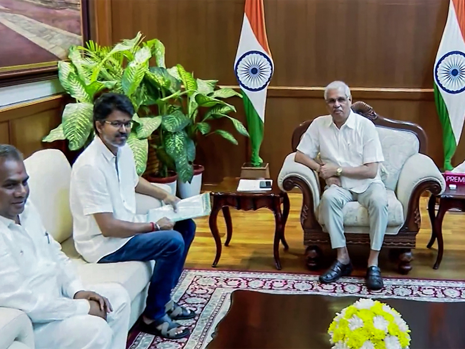TVK chief Vijay with Tamil Nadu Governor Rajendra Arlekar (Photo/ANI)