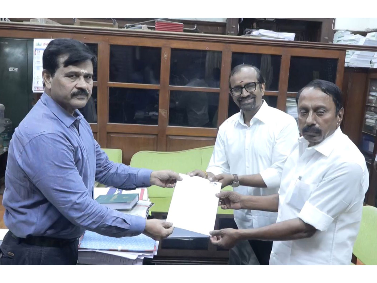Tamil Nadu Ministers KA Sengottaiyan and P Venkataramanan submit CM Vijay's resignation from Trichy East to Secretary of the Legislative Assembly, Dr K Srinivasan (Photo/Tamil Nadu DIPR) Tamil Nadu Ministers KA Sengottaiyan and P Venkataramanan submit CM Vijay's resignation from Trichy East to Secretary of the Legislative Assembly, Dr K Srinivasan (Photo/Tamil Nadu DIPR)