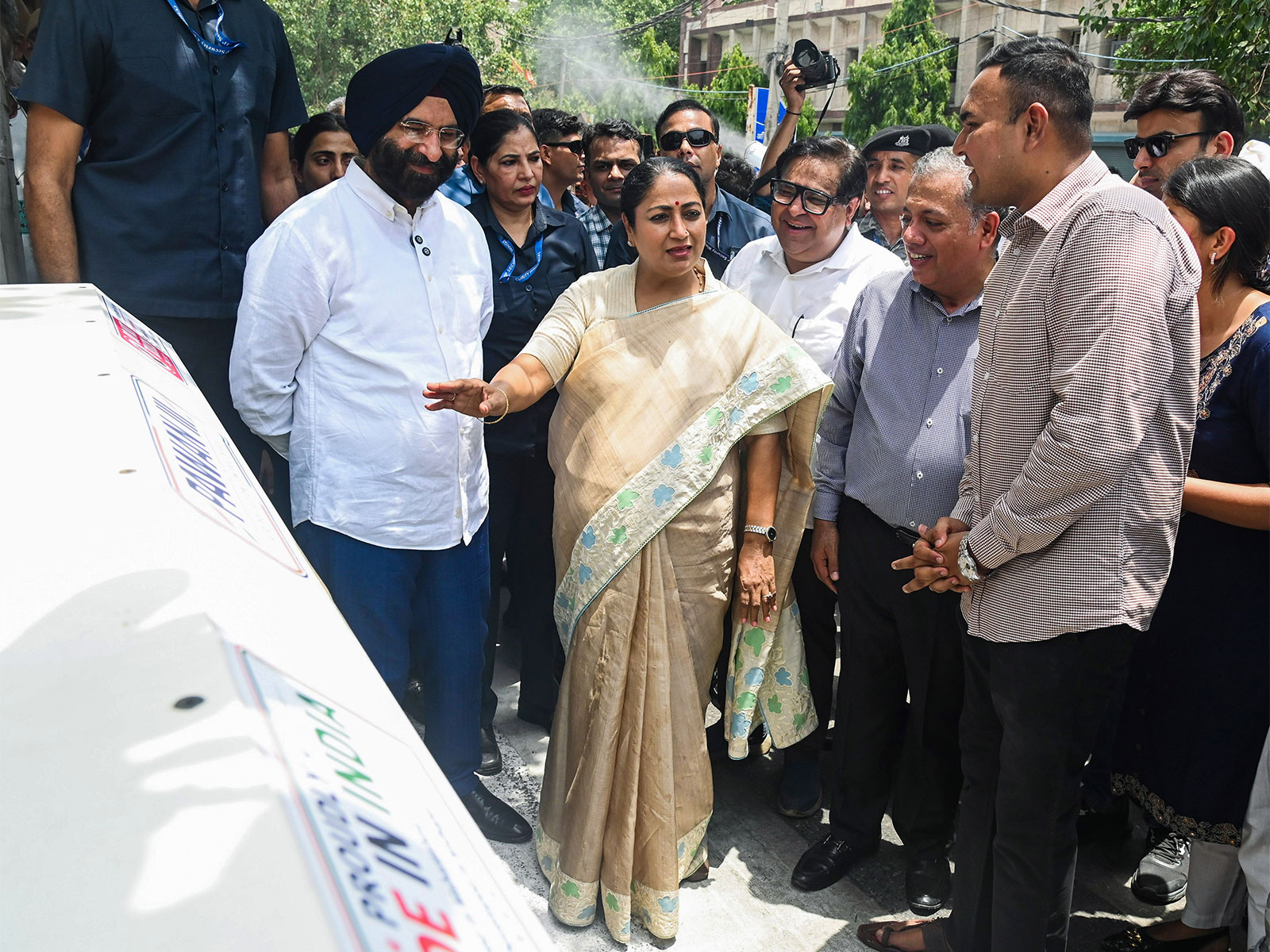 Delhi Chief Minister Rekha Gupta with Delhi minister Manjinder Singh Sirsa, inspects the newly installed central verge-based air purifiers at Kriti Nagar (Photo/ANI)