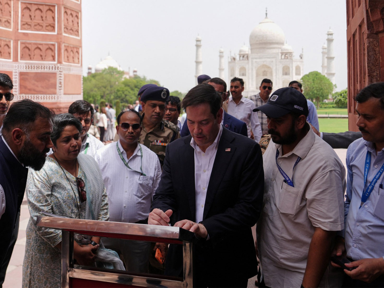 United States Secretary of State Marco Rubio signs the visitors’ book during his visit to the Taj Mahal (Photo/Reuters)