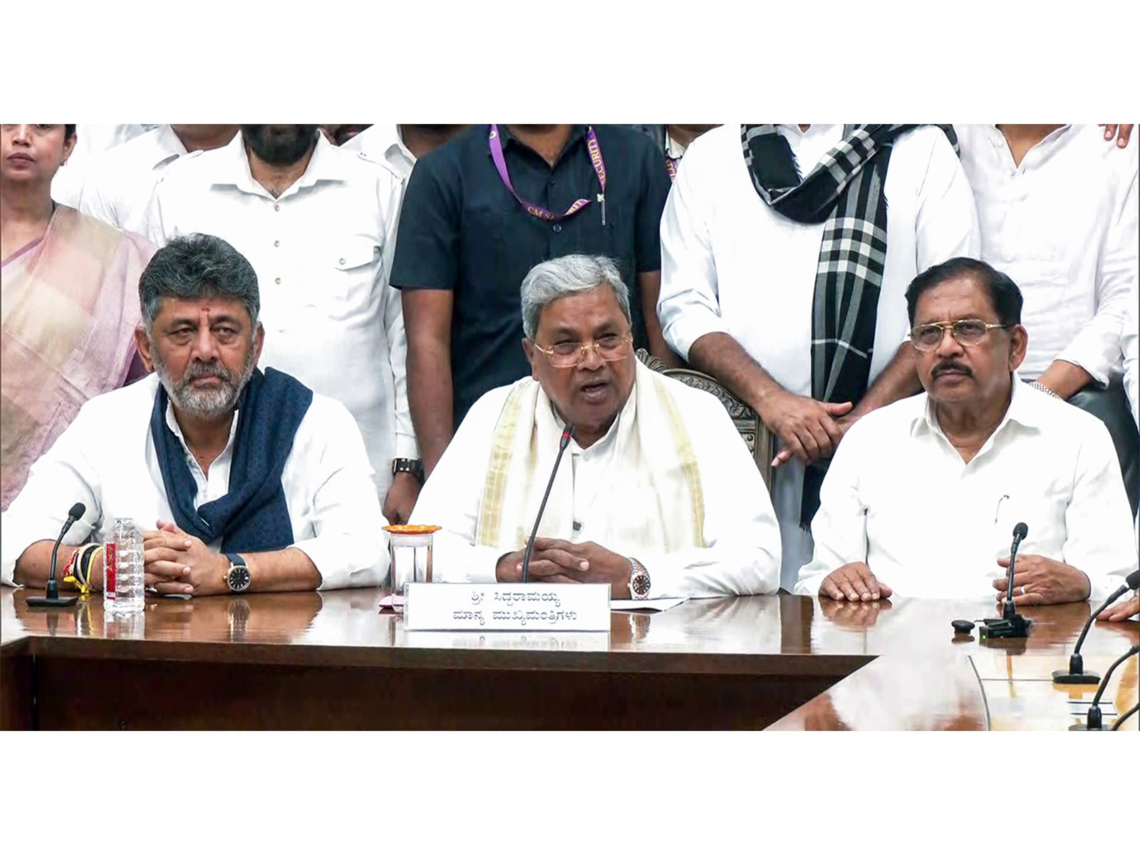 Siddaramaiah (middle), Karnataka Deputy Chief Minister DK Shivakumar (left) and Home Minister G Parameshwara (right) (Photo/ANI)