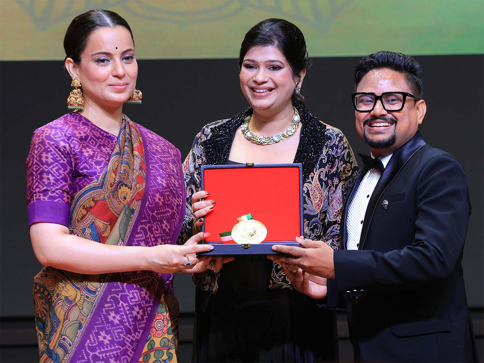 On stage at the Rashtriya Ratna Samman 2026, Mr. Vivek Kumar, Owner of My Print, receives the award for 'Most Trusted Name in Customized Printing Startup Business Solutions from Siliguri, West Bengal' from Ms. Kangana Ranaut. On stage at the Rashtriya Ratna Samman 2026, Mr. Vivek Kumar, Owner of My Print, receives the award for 'Most Trusted Name in Customized Printing Startup Business Solutions from Siliguri, West Bengal' from Ms. Kangana Ranaut.