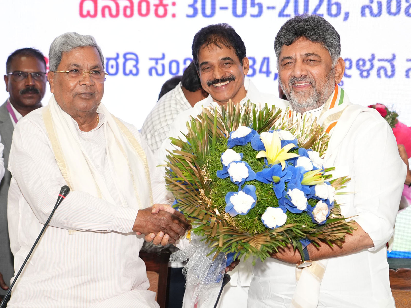 Outgoing Karnataka CM Siddaramaiah congratulates DK Shivakumar (Photo/Xsiddaramaiah) Outgoing Karnataka CM Siddaramaiah congratulates DK Shivakumar (Photo/Xsiddaramaiah)