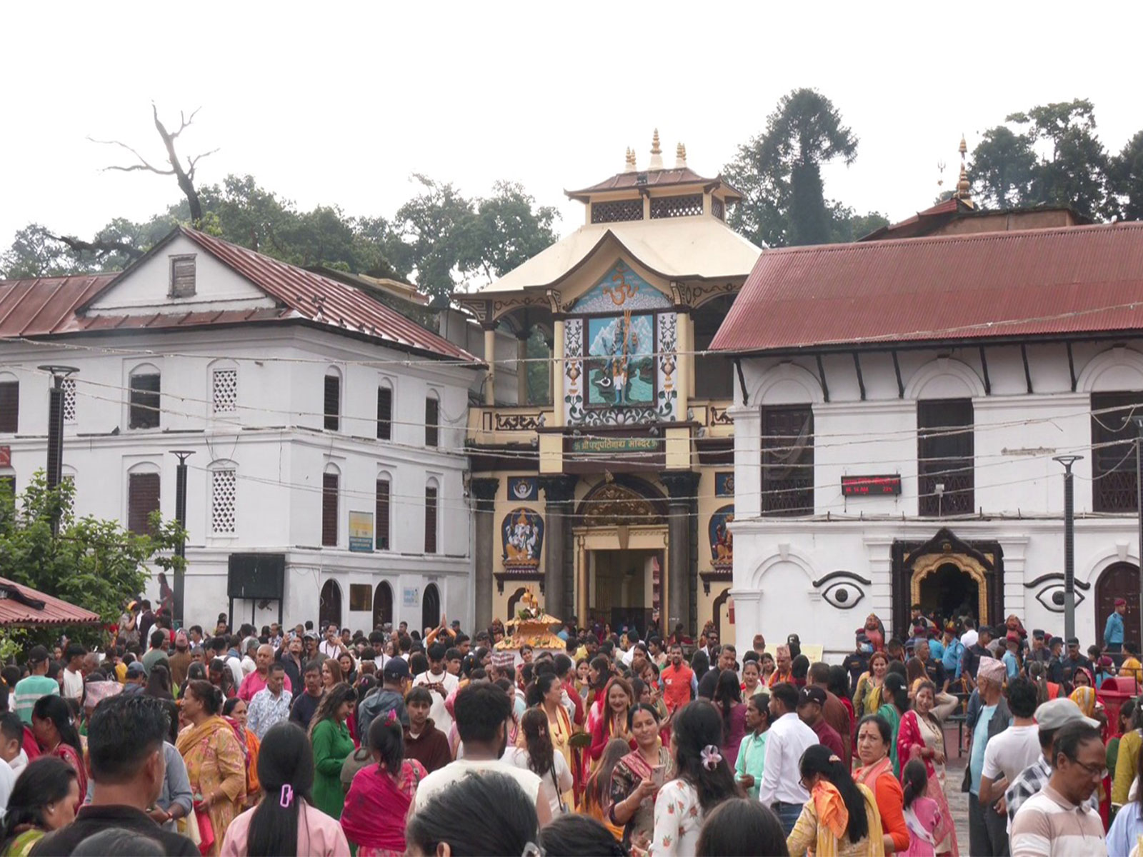 A large number of devotees gather at the Pashupatinath Temple in Kathmandu on the first Monday of the holy month of Shrawan. (Photo/ANI) A large number of devotees gather at the Pashupatinath Temple in Kathmandu on the first Monday of the holy month of Shrawan. (Photo/ANI)