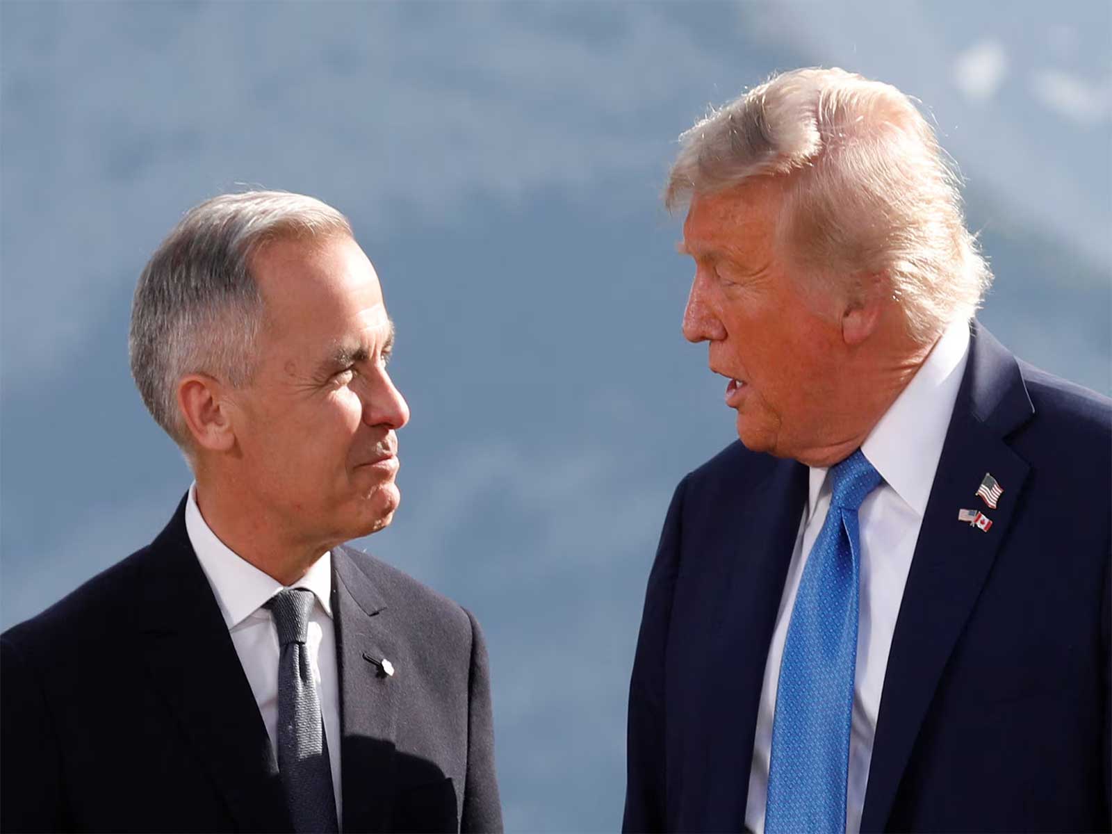 US President Donald Trump and Canadian Prime Minister Mark Carney speak during a family photo at the 2025 G7 Summit in Kananaskis, Alberta, Canada. (File Photo/Reuters) US President Donald Trump and Canadian Prime Minister Mark Carney speak during a family photo at the 2025 G7 Summit in Kananaskis, Alberta, Canada. (File Photo/Reuters)