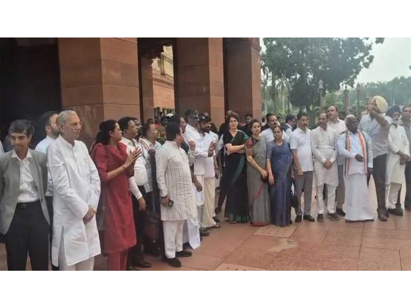 Opposition MPs staging protest in parliament (Photo/ANI) Opposition MPs staging protest in parliament (Photo/ANI)