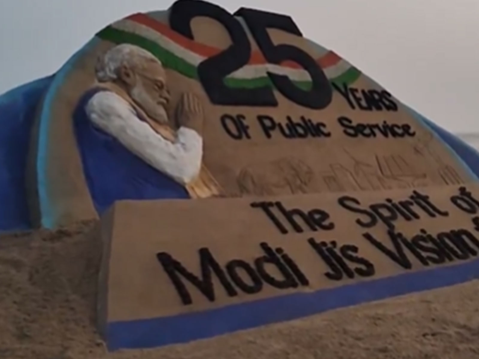 Renowned sand artist Sudarsan Pattnaik creates sand sculpture to mark PM Modi’s 25 years in public service