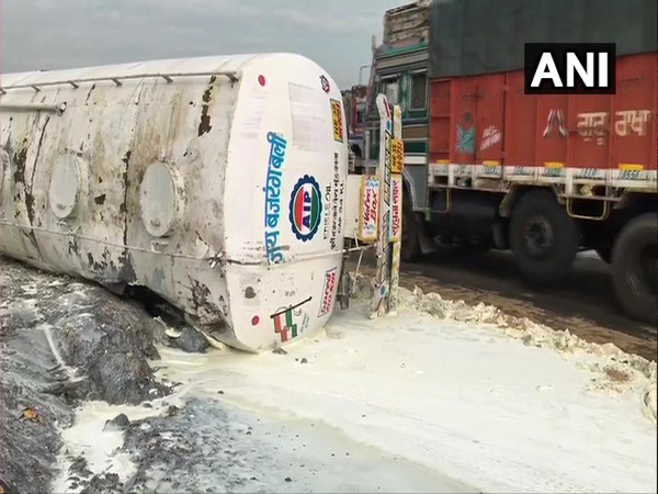 A tanker truck, carrying ingredients to make soap, overturns in West Bengal (Photo ANI)