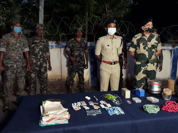 Visual of Odisha police with the materials seized during anti-maoists operation  (Photo/ANI)