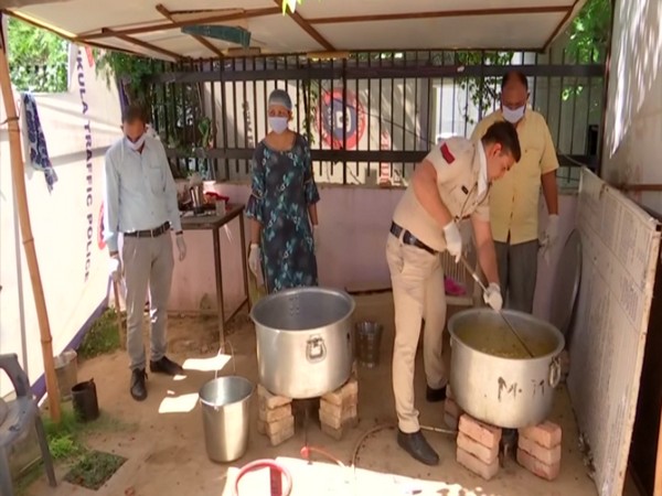 Panchkula police distributes food among the needy amid COVID-19 lockdown. Photo/ ANI