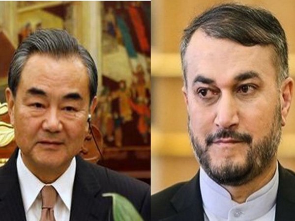 Chinese Foreign Minister Wang Yi and Iranian Foreign Minister Hossein Amir Abdollahian.