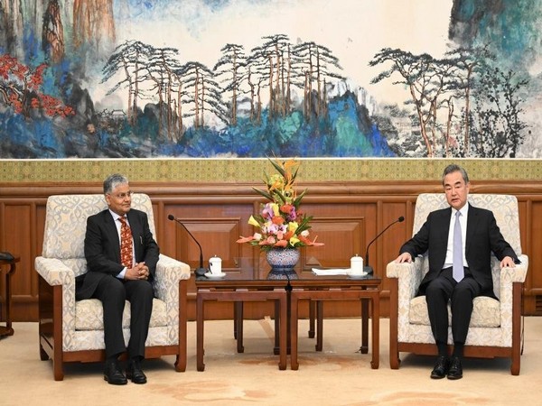 Chinese Foreign Minister Wang Yi met with Pradeep Kumar Rawat, India's new ambassador to China in Beijing. (Global Times Twitter handle)