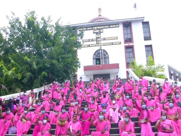 ASHA workers protesting in front of deputy commissioner's office in Shivamogga. (Photo/ANI)