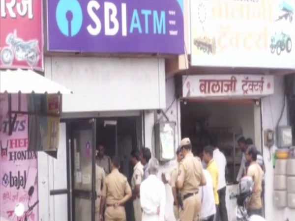 Police at the Yevat SBI unit from where ATM with Rs 30 lakh was stolen. (Photo/ANI)
