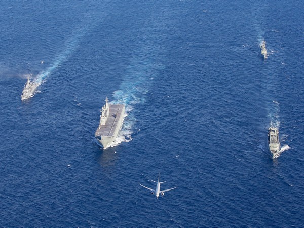 (L-R) HMAS Ships Parramatta, Canberra, Newcastle and Success in formation with a P-8A Poseidon and a MH60-R Maritime Combat Helicopter off W. Australia coast during Indo-Pacific Endeavour 2019