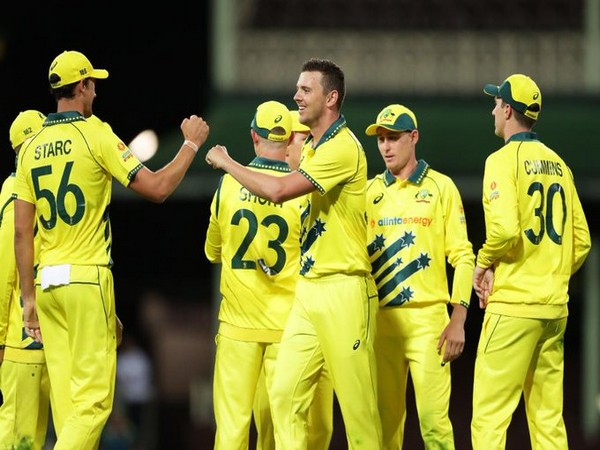 Australian team celebrating after taking 1-0 lead in the three-match ODI series. (Photo/ICC Twitter)