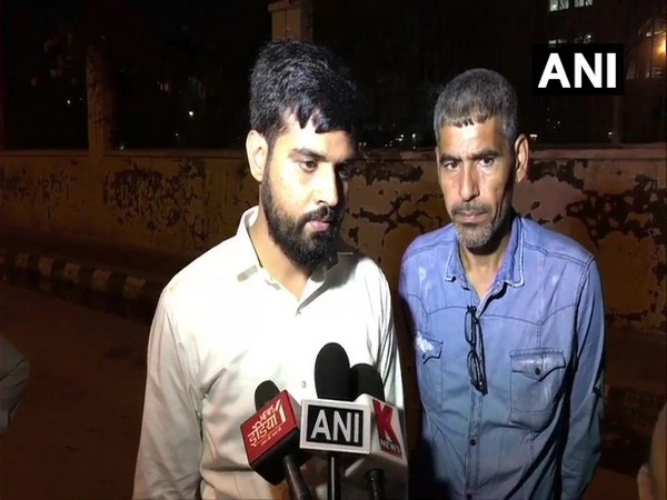 Translator Abdul Waris 