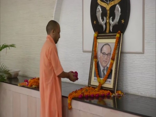 UP Chief Minister Yogi Adityanath on Tuesday paid floral tribute to Dr Bhimrao Ambedkar in Lucknow. 