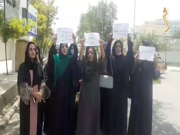 A group of Afghan women holding a street protest calling on the Taliban to protect their rights (Photo Credit - Reuters)