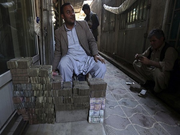 An Afghan money changer. (Photo Credit - Reuters)