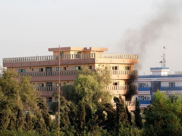 Smoke billowing out of government building following a Taliban attack on Wednesday